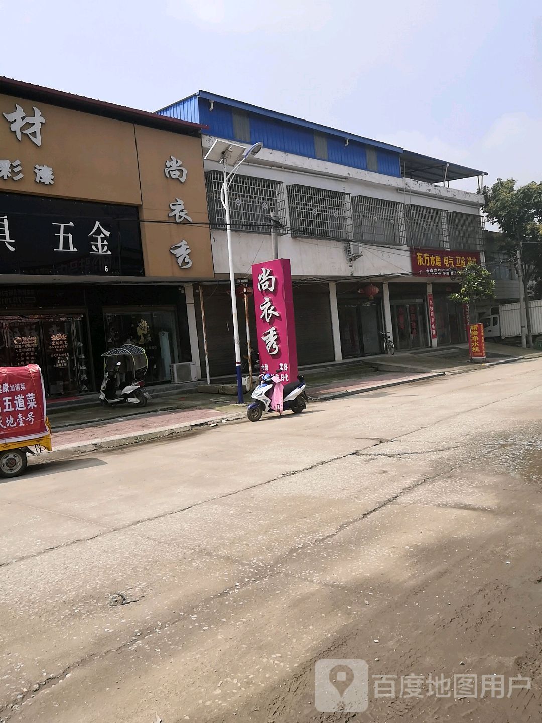 驻马店市泌阳县官泰路与泌郭路交叉路口往南约70米